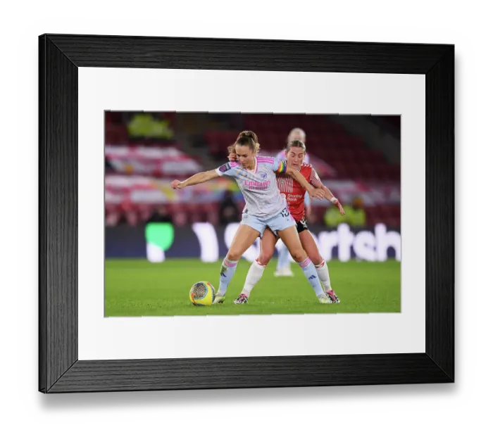 Framed Print : Intense Battle for Possession: Arsenal vs Southampton - FA Women's Continental Tyres League Cup Clash at St. Mary's Stadium