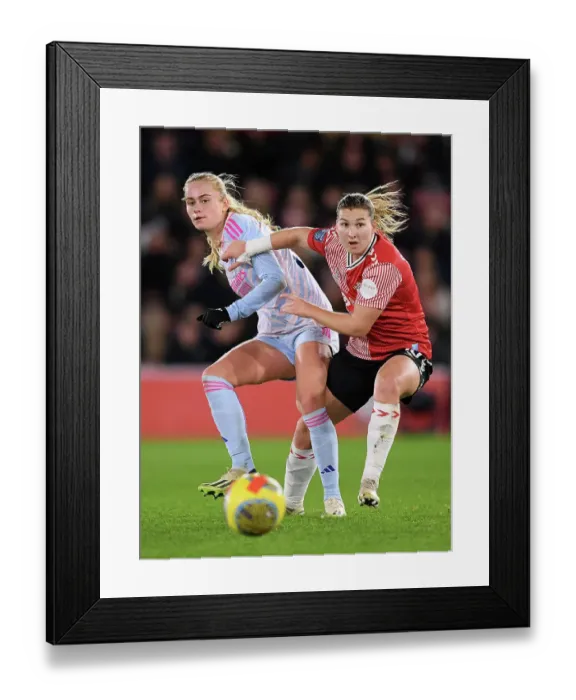 Framed Print : Arsenal vs Southampton: A Fierce Battle in the FA Women's Continental Tyres League Cup at St. Mary's Stadium