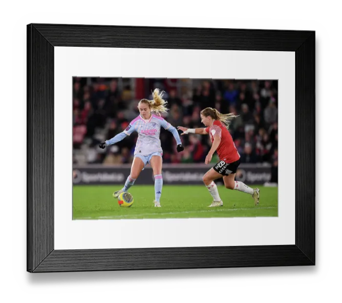 Framed Print : Intense Battle for Possession: Arsenal vs. Southampton - FA Women's Continental Tyres League Cup Clash