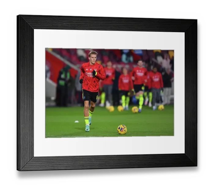Framed Print : Arsenal's Martin Odegaard Gears Up for Brentford Clash in Premier League 2023-24 Framed Print : Arsenal's Martin Odegaard Gears Up for Brentford Clash in Premier League 2023-24
