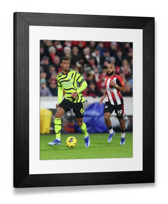 Framed Print : Gabriel Faces Pressure: Brentford vs. Arsenal, Premier League 2023-24