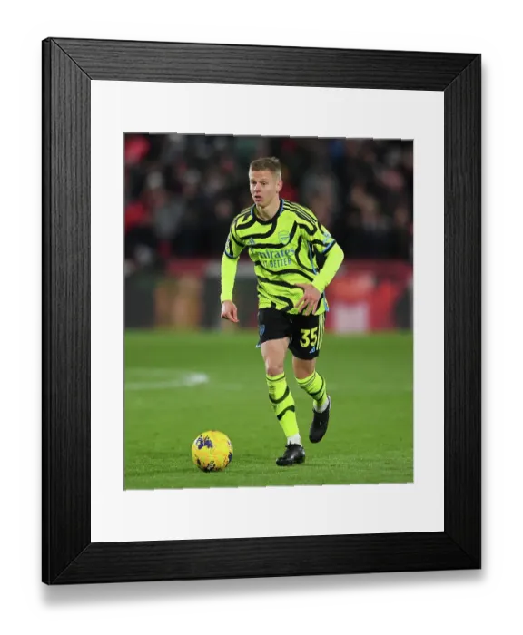 Framed Print : Zinchenko's Star Performance: Arsenal's Triumph Over Brentford (2023-24 Premier League)