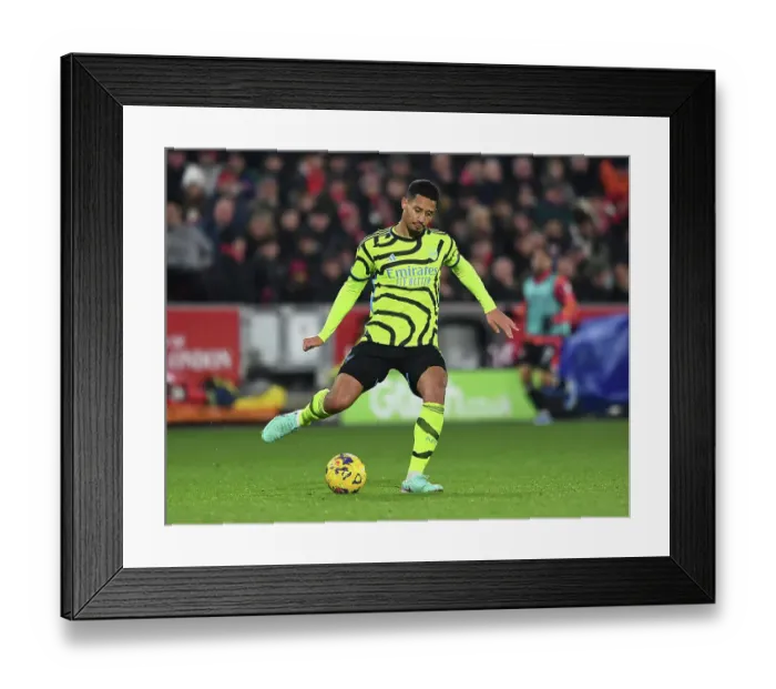 Framed Print : William Saliba's Standout Performance: Arsenal's Defender Shines in the Premier League Clash Against Brentford (2023-24)