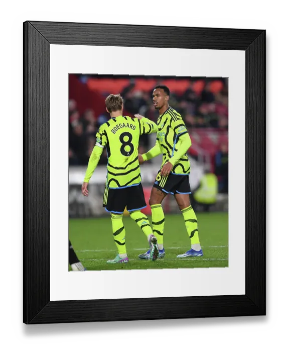 Framed Print : Arsenal's Martin Odegaard and Gabriel Magalhaes in Action against Brentford in 2023-24 Premier League Framed Print : Arsenal's Martin Odegaard and Gabriel Magalhaes in Action against Brentford in 2023-24 Premier League