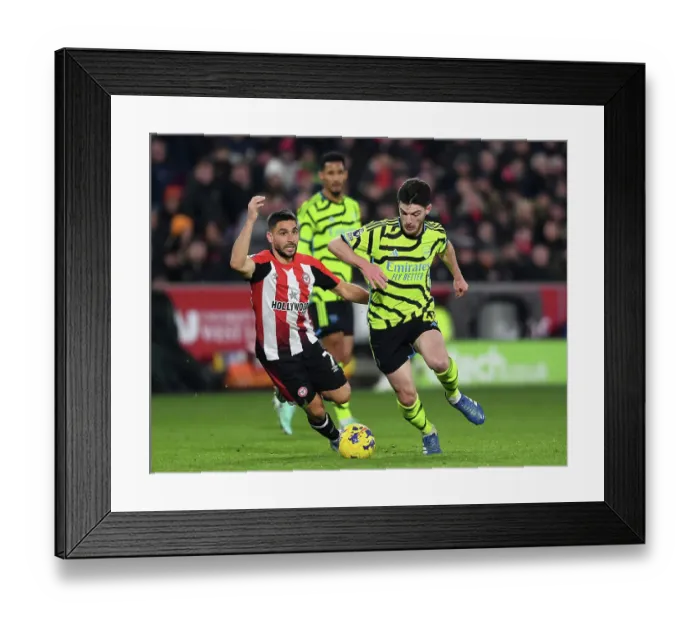Framed Print : Intense Battle for Possession: Brentford vs Arsenal (2023-24)