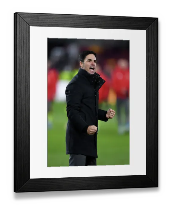 Framed Print : Mikel Arteta's Triumph: Arsenal's Victory at Brentford's Gtech Community Stadium (2023-24)