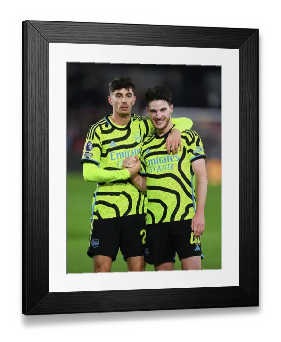 Framed Print : Arsenal Celebrate Victory Over Brentford: Havertz and Rice Rejoice