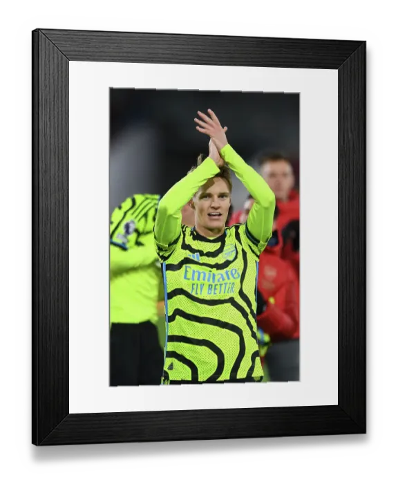 Framed Print : Arsenal's Victory at Brentford: Martin Odegaard Celebrates with Fans (2023-24) Framed Print : Arsenal's Victory at Brentford: Martin Odegaard Celebrates with Fans (2023-24)