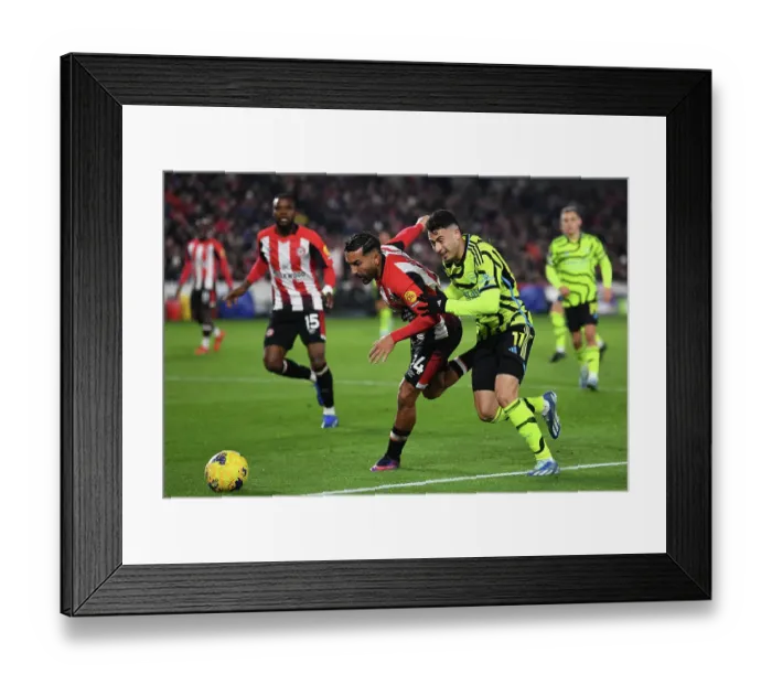 Framed Print : Gabriel Martinelli Pressures Saman Ghoddos: Brentford vs Arsenal, Premier League 2023-24