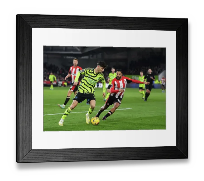 Framed Print : Brentford vs Arsenal: Kai Havertz Faces Off Against Saman Ghoddos in Premier League Clash Framed Print : Brentford vs Arsenal: Kai Havertz Faces Off Against Saman Ghoddos in Premier League Clash