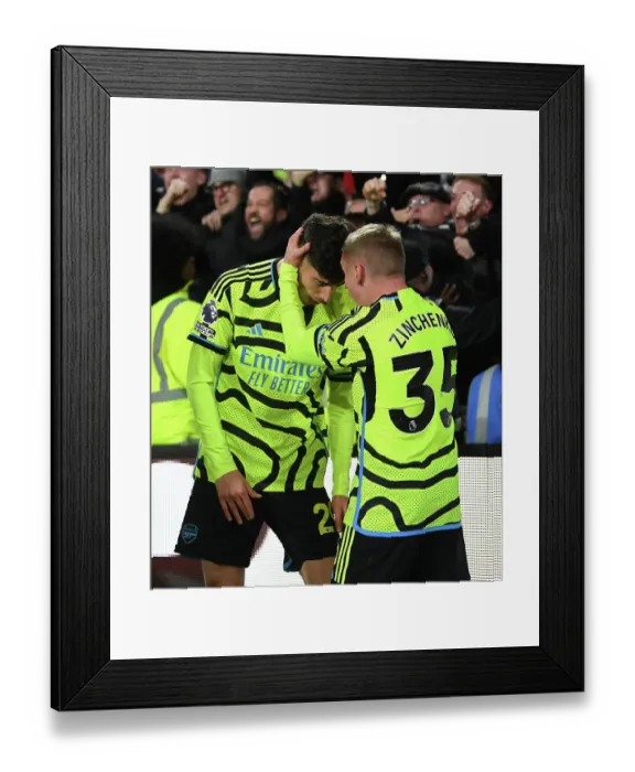 Framed Print : Arsenal's Jubilant Moment: Havertz and Zinchenko Celebrate Goal vs Brentford, Premier League 2023-24