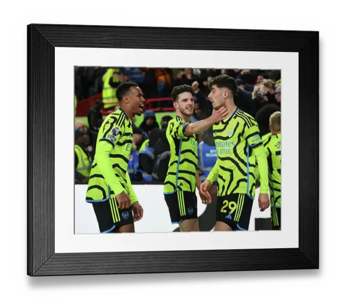 Framed Print : Havertz, Rice, and Magalhaes Celebrate Arsenal's Goal Against Brentford (2023-24)