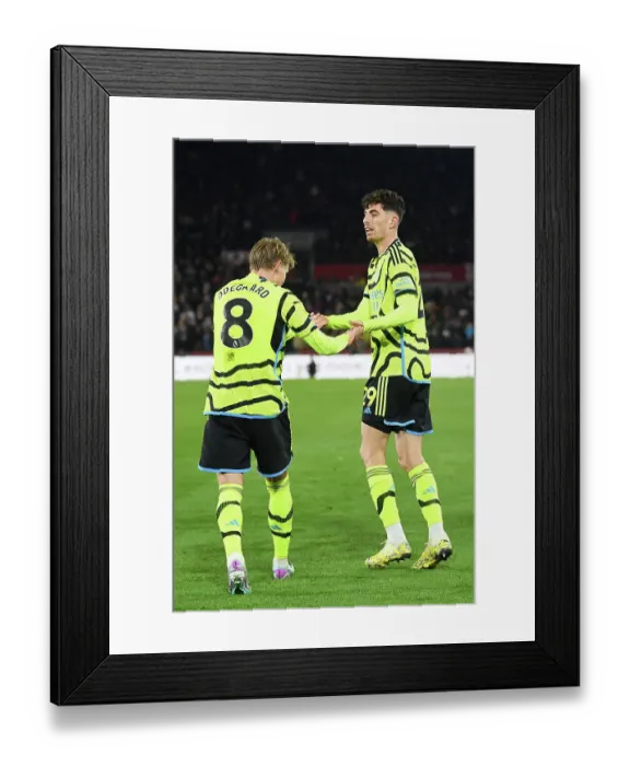 Framed Print : Arsenal's Havertz and Odegaard Celebrate First Goal in Brentford Victory (2023-24)