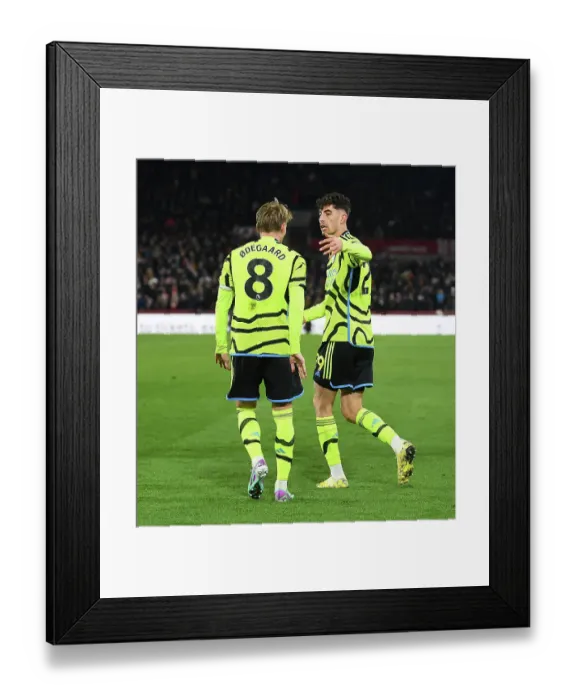 Framed Print : Jubilant Havertz and Odegaard: Arsenal's Unstoppable Duo Celebrates Goal vs Brentford, Premier League 2023-24