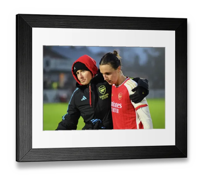Framed Print : Arsenal Women's Victory: Leah Williamson and Lotte Wubben-Moy's Emotional Reunion After Defeating West Ham United