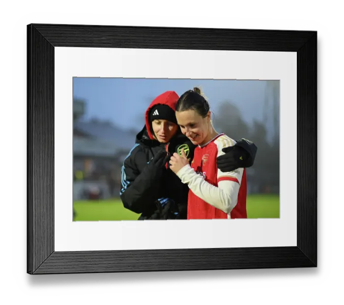 Framed Print : Arsenal Women's Glory: Leah Williamson and Lotte Wubben-Moy's Emotional Reunion after Securing Victory over West Ham United in the Barclays Super League Framed Print : Arsenal Women's Glory: Leah Williamson and Lotte Wubben-Moy's Emotional Reunion after Securing Victory over West Ham United in the Barclays Super League