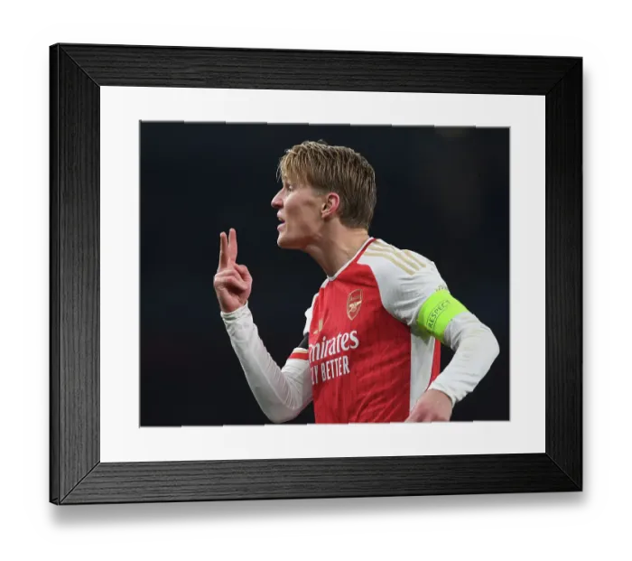 Framed Print : Martin Odegaard Shines: Arsenal's Champions League Victory Over RC Lens Framed Print : Martin Odegaard Shines: Arsenal's Champions League Victory Over RC Lens