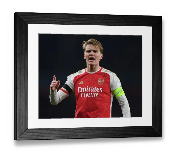 Framed Print : Martin Odegaard's Brilliant Performance: Arsenal's Champions League Victory Over RC Lens (2023-24)