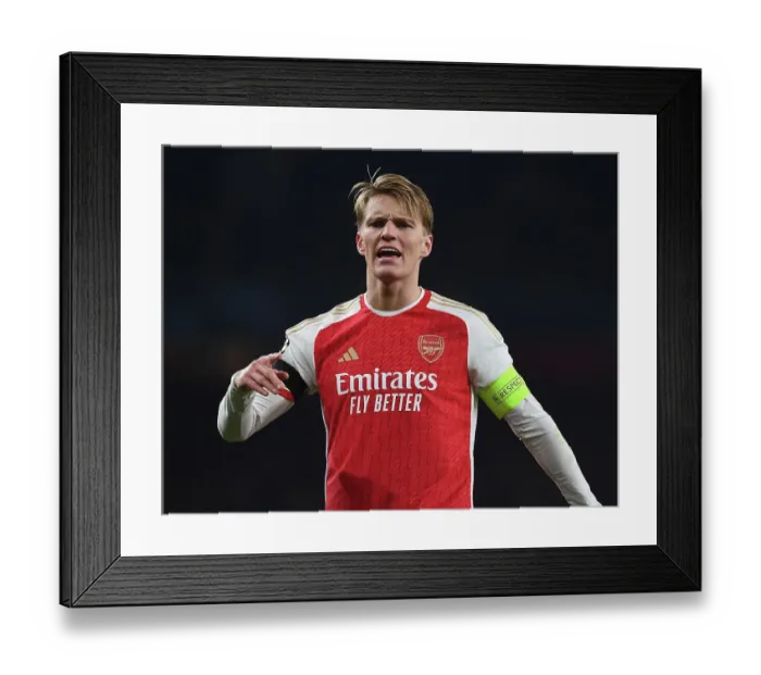 Framed Print : Martin Odegaard's Brilliant Performance: Arsenal's Commanding Victory Over RC Lens in Champions League