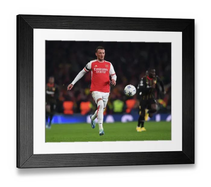 Framed Print : Arsenal's Ben White in Action against RC Lens in 2023-24 UEFA Champions League Framed Print : Arsenal's Ben White in Action against RC Lens in 2023-24 UEFA Champions League