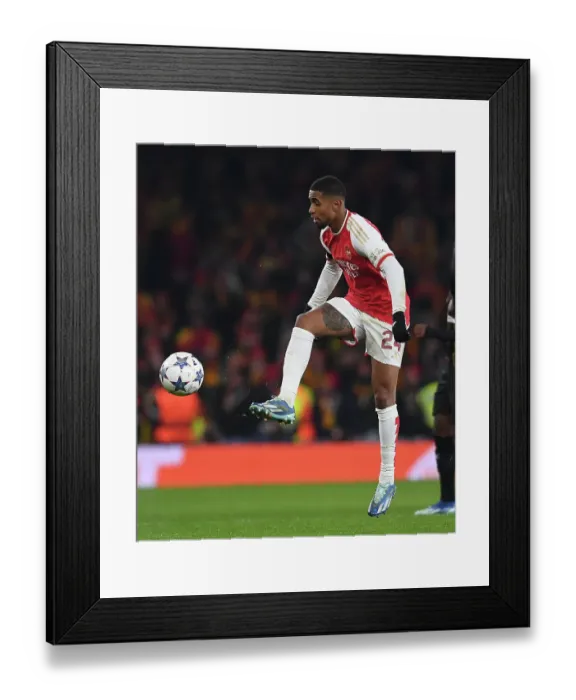 Framed Print : Arsenal's Reiss Nelson Shines in Champions League Clash Against RC Lens (2023-24)