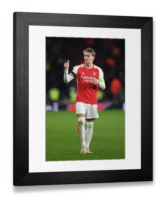 Framed Print : Arsenal's Champions League Triumph: Martin Odegaard Reacts to Arsenal FC's Victory over RC Lens (2023-24) Framed Print : Arsenal's Champions League Triumph: Martin Odegaard Reacts to Arsenal FC's Victory over RC Lens (2023-24)