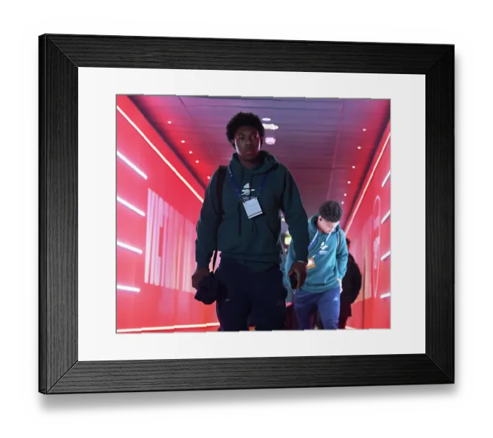 Framed Print : Myles Lewis-Skelly: Arsenal's Focused Star Ahead of Arsenal vs RC Lens, UEFA Champions League 2023