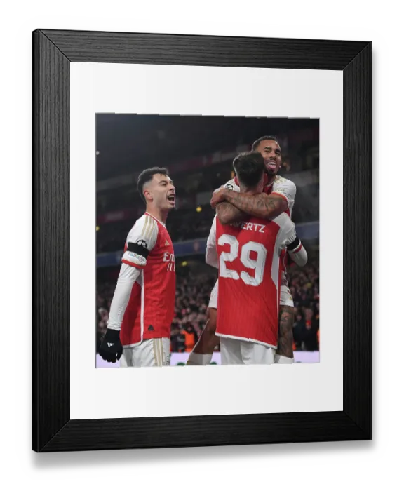 Framed Print : Arsenal's Havertz, Jesus, and Martinelli Celebrate First Goal Against RC Lens in 2023-24 UEFA Champions League