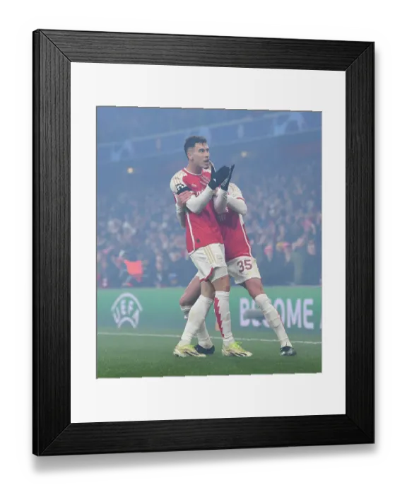 Framed Print : Arsenal's Martinelli Scores Fourth Goal in Champions League Victory over RC Lens (2023-24)