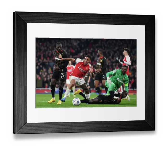 Framed Print : Gabriel Jesus vs. Massadio Haidara: A Champions League Battle at Arsenal's Emirates Stadium