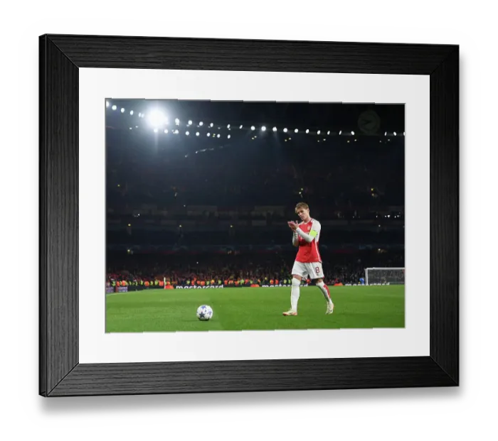 Framed Print : Arsenal's Martin Odegaard Celebrates with Fans vs. RC Lens in 2023-24 UEFA Champions League