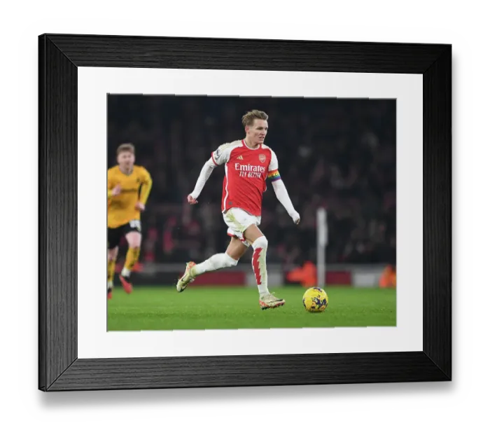 Framed Print : Arsenal's Martin Odegaard Shines in Premier League Clash Against Wolverhampton Wanderers (2023-24)