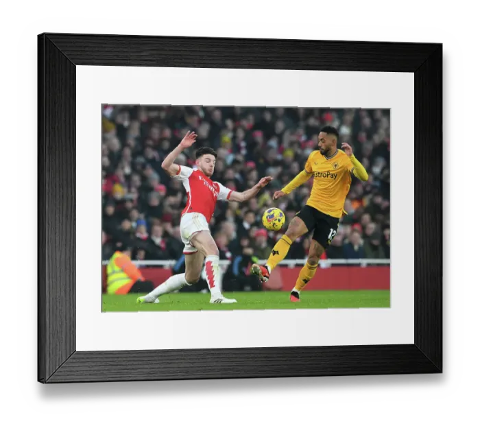 Framed Print : Matheus Cunha vs. Declan Rice: A Premier League Battle - Arsenal vs. Wolverhampton Wanderers, 2023-24
