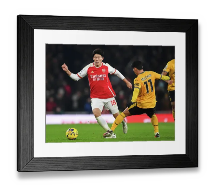 Framed Print : Arsenal vs. Wolverhampton Wanderers: Tomiyasu vs. Hwang Hee-Chan - A Premier League Battle at Emirates Stadium (2023-24)