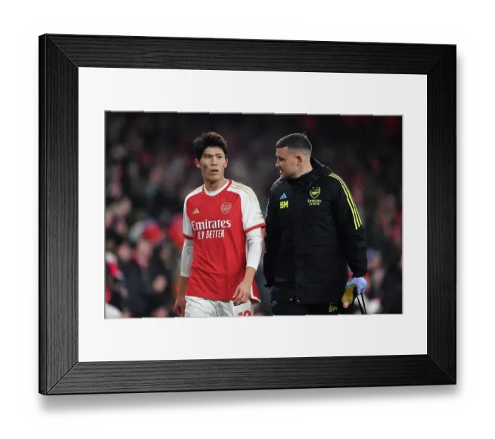Framed Print : Arsenal's Tomiyasu Suffers Injury in Arsenal vs. Wolverhampton Clash (2023-24) Framed Print : Arsenal's Tomiyasu Suffers Injury in Arsenal vs. Wolverhampton Clash (2023-24)
