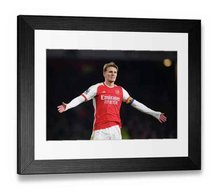 Framed Print : Martin Odegaard's Emotional Moment: Arsenal's Struggle Against Wolverhampton Wanderers (2023-24)