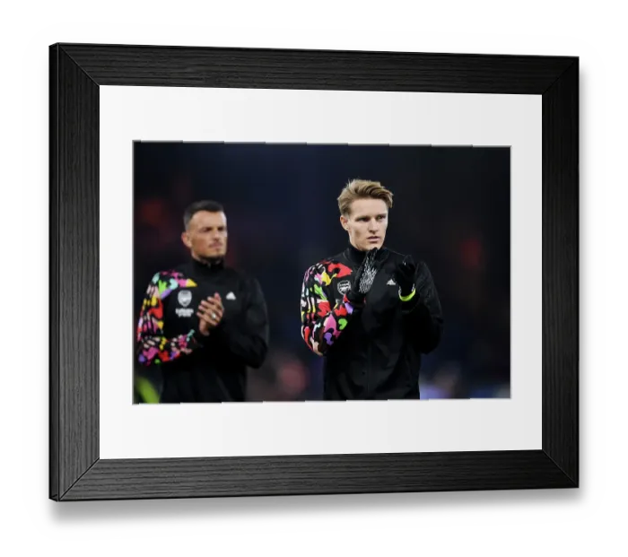 Framed Print : Arsenal's Martin Odegaard Warming Up Ahead of Luton Town Clash (2023-24)