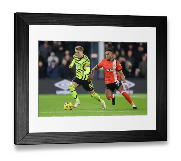 Framed Print : Martin Odegaard Faces Pressure from Jacob Brown in Luton Town vs Arsenal Premier League Clash (2023-24) Framed Print : Martin Odegaard Faces Pressure from Jacob Brown in Luton Town vs Arsenal Premier League Clash (2023-24)