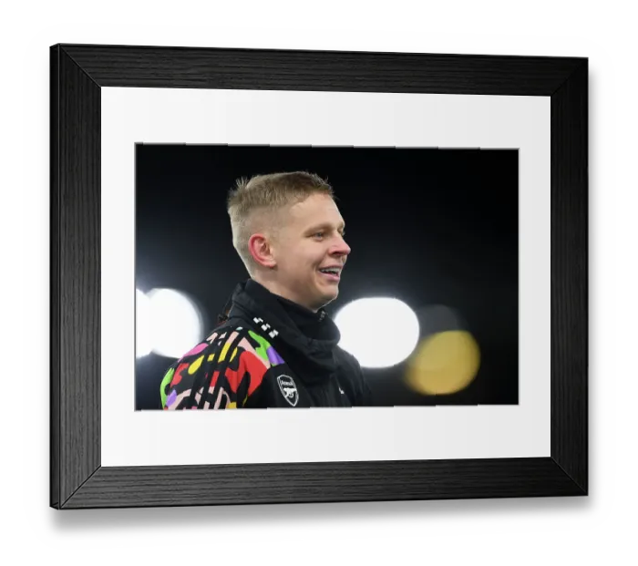 Framed Print : Arsenal's Zinchenko Warming Up Ahead of Luton Town Clash (Premier League 2023-24)