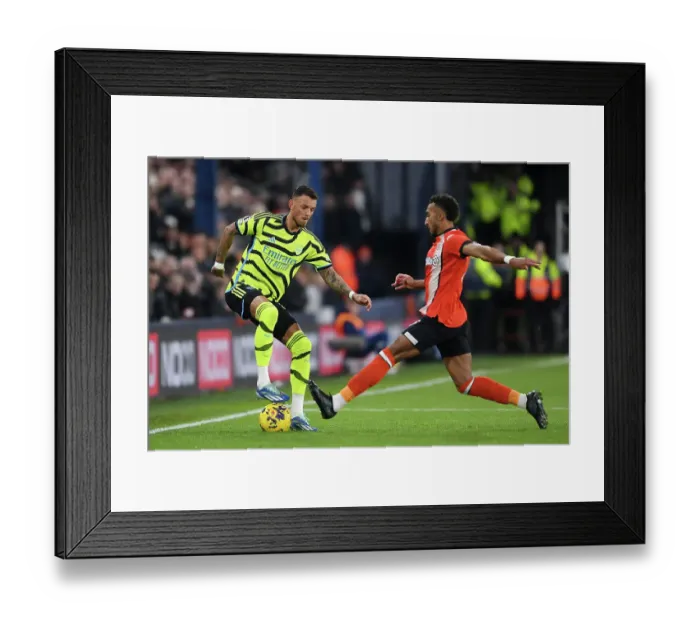 Framed Print : Arsenal's Ben White Fends Off Luton Pressure in 2023-24 Premier League Clash
