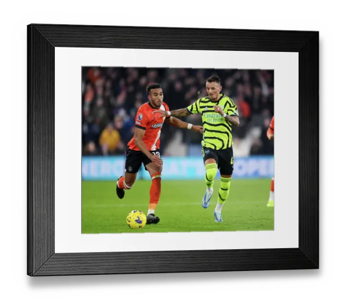 Framed Print : Ben White Stands Firm: Arsenal's Defender Shines Amidst Luton's Pressure in Premier League Clash (2023-24) Framed Print : Ben White Stands Firm: Arsenal's Defender Shines Amidst Luton's Pressure in Premier League Clash (2023-24)