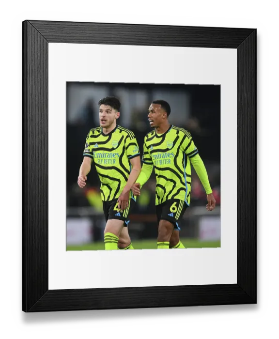 Framed Print : Arsenal's Gabriel Magalhaes and Declan Rice Clash in Luton Town vs Arsenal Premier League Match, 2023-24 Framed Print : Arsenal's Gabriel Magalhaes and Declan Rice Clash in Luton Town vs Arsenal Premier League Match, 2023-24