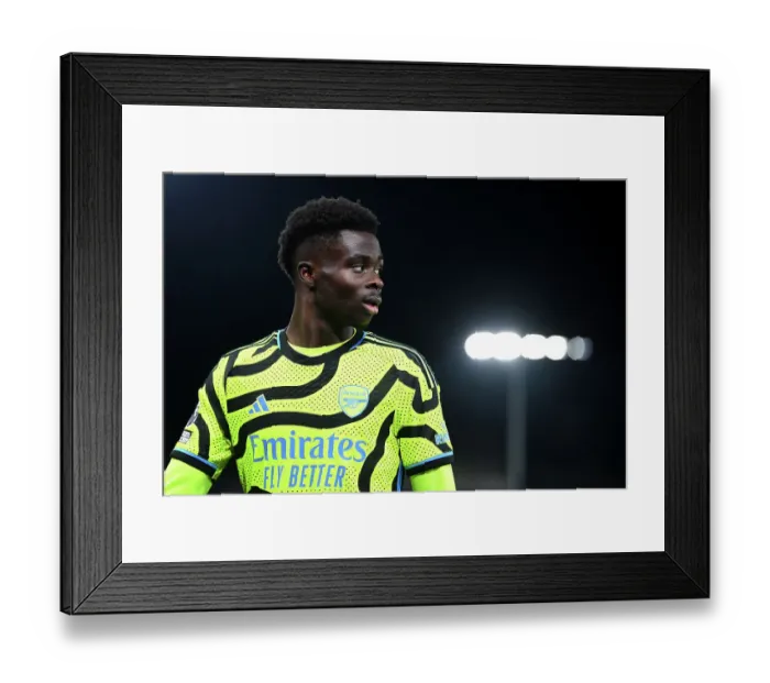 Framed Print : Bukayo Saka's Focus: Arsenal vs. Luton Town, Premier League 2023-24