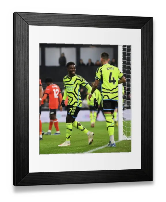 Framed Print : Arsenal's Bukayo Saka and Ben White Celebrate Second Goal vs. Luton Town (2023-24)