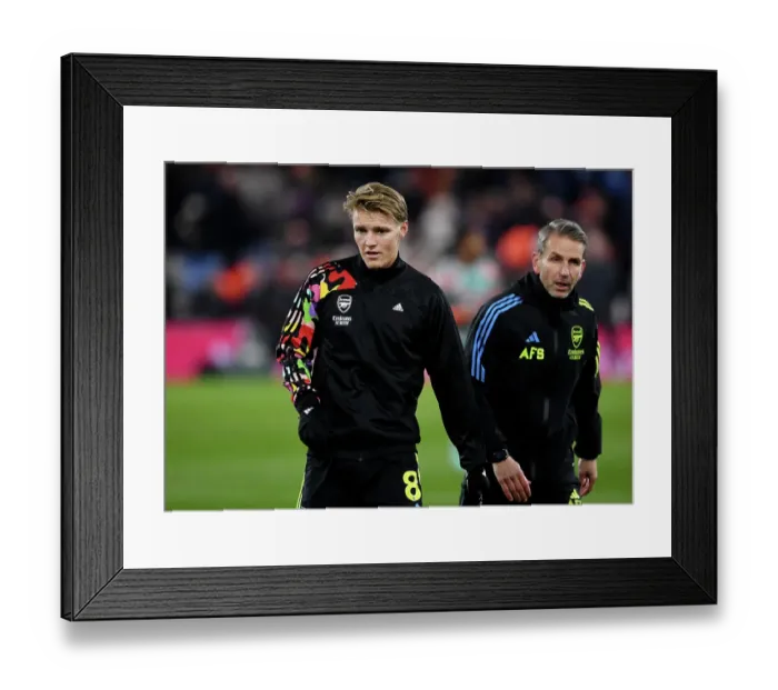 Framed Print : Martin Odegaard Gears Up: Arsenal's Star Player Prepares for Luton Town Clash (2023-24)