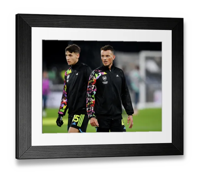 Framed Print : Arsenal's Ben White Warming Up Ahead of Luton Town Clash (2023-24)