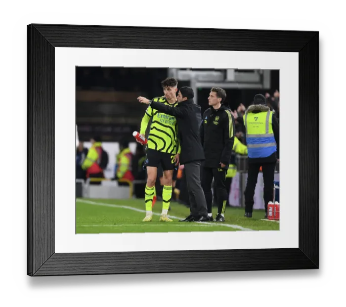 Framed Print : Arsenal's Mikel Arteta Engages with Kai Havertz Amidst Luton Town Clash (2023-24)