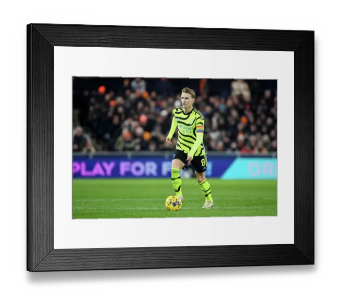 Framed Print : Charging Ahead: Martin Odegaard's Determined Rush in Arsenal's Premier League Victory over Luton Town (2023-24) Framed Print : Charging Ahead: Martin Odegaard's Determined Rush in Arsenal's Premier League Victory over Luton Town (2023-24)