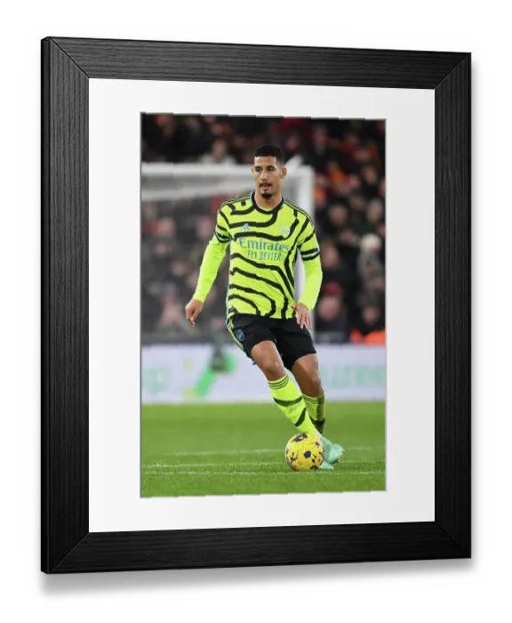 Framed Print : William Saliba Charges Forward: Luton Town vs. Arsenal FC, Premier League 2023-24