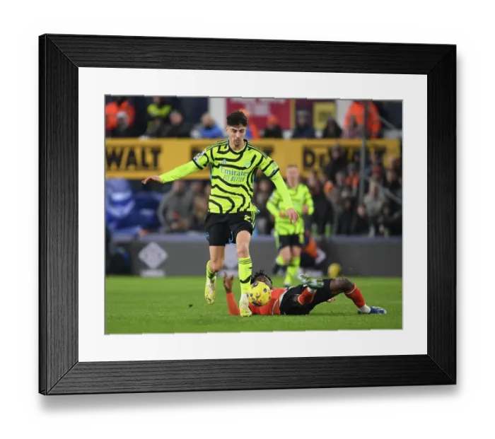 Framed Print : Arsenal's Kai Havertz Scores Past Luton's Issa Kabore in Premier League Clash (Luton Town vs Arsenal 2023-24)